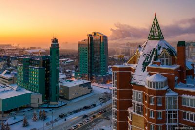 Офис Газпром трансгаз Сургут на закате фото